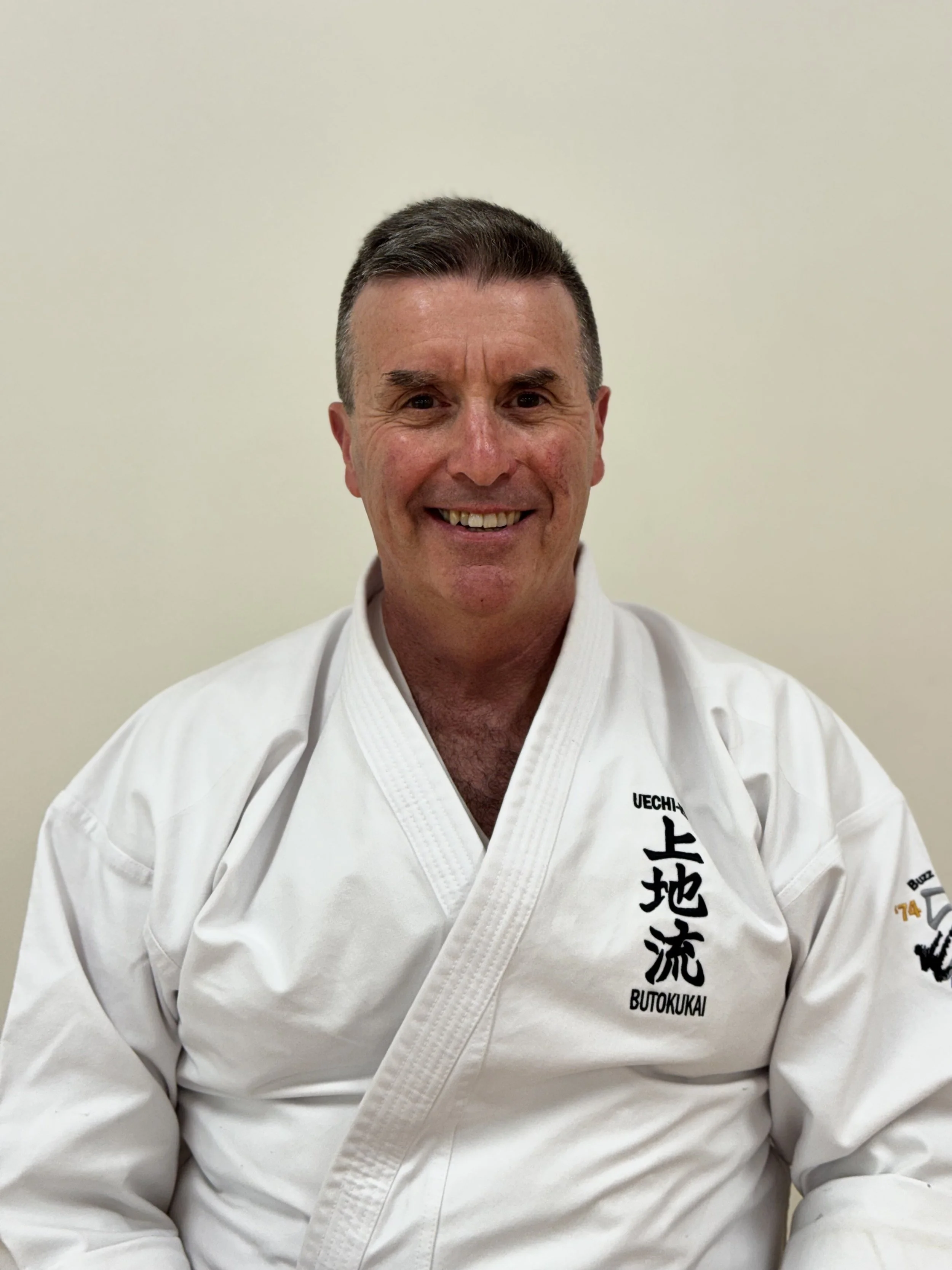 David Kelley in a karate uniform