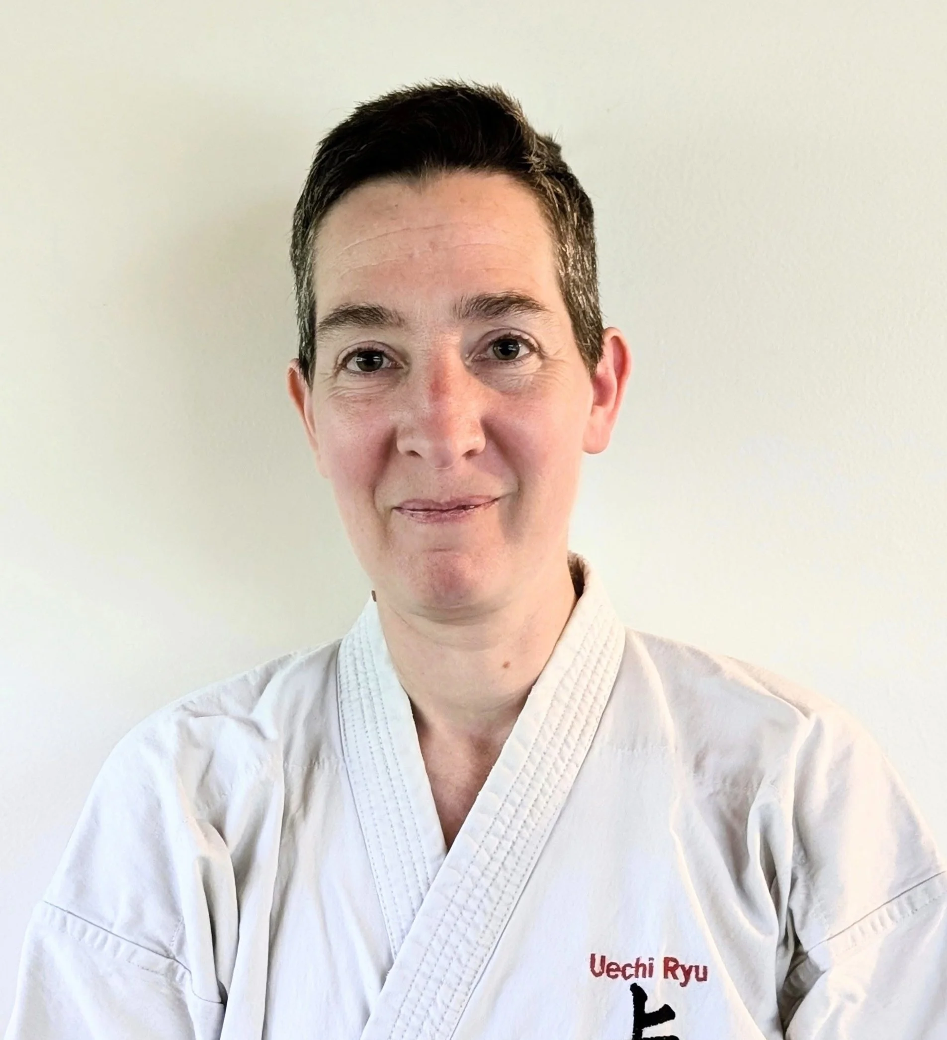 Jen Patashnick in a karate uniform