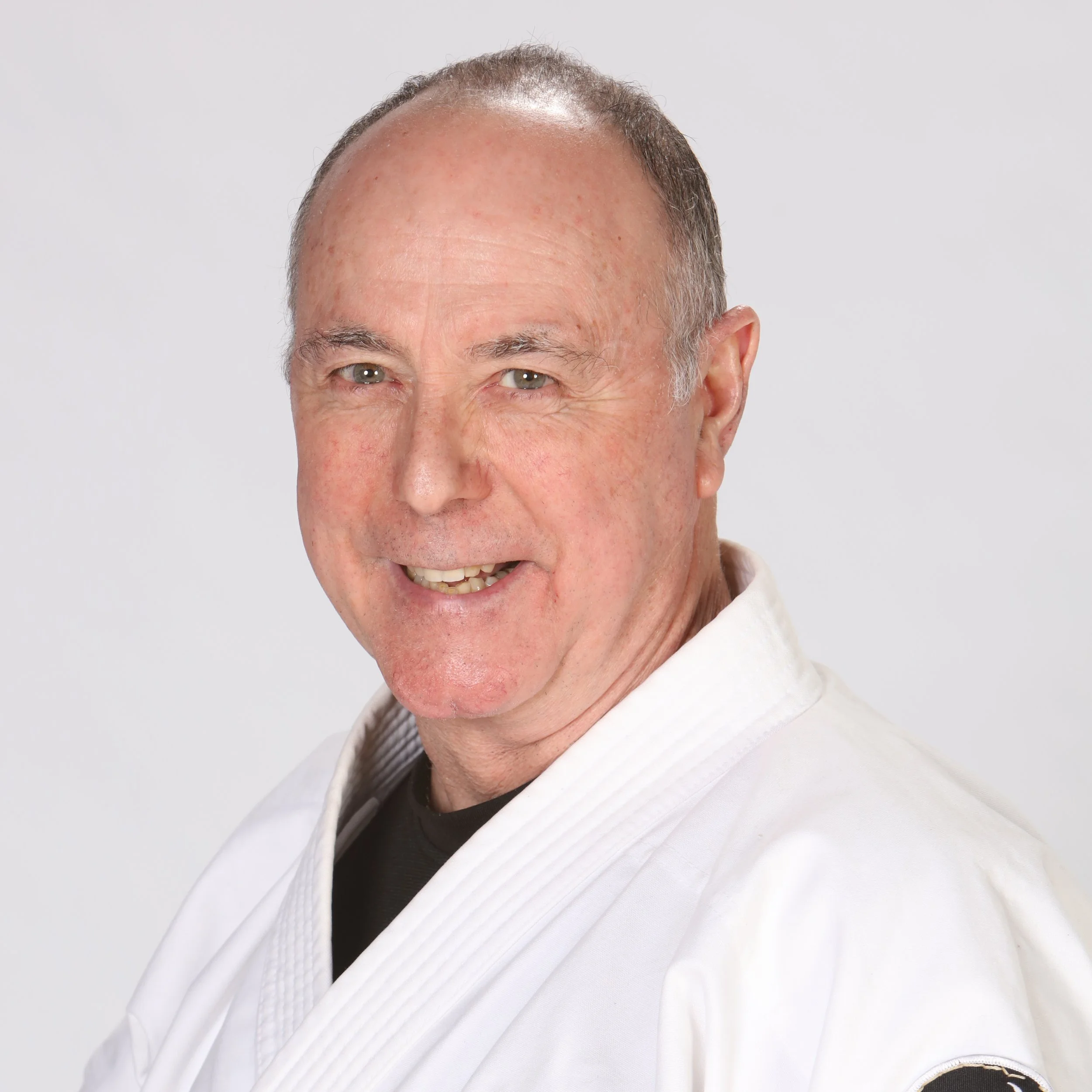 Jim Cameron in a karate uniform