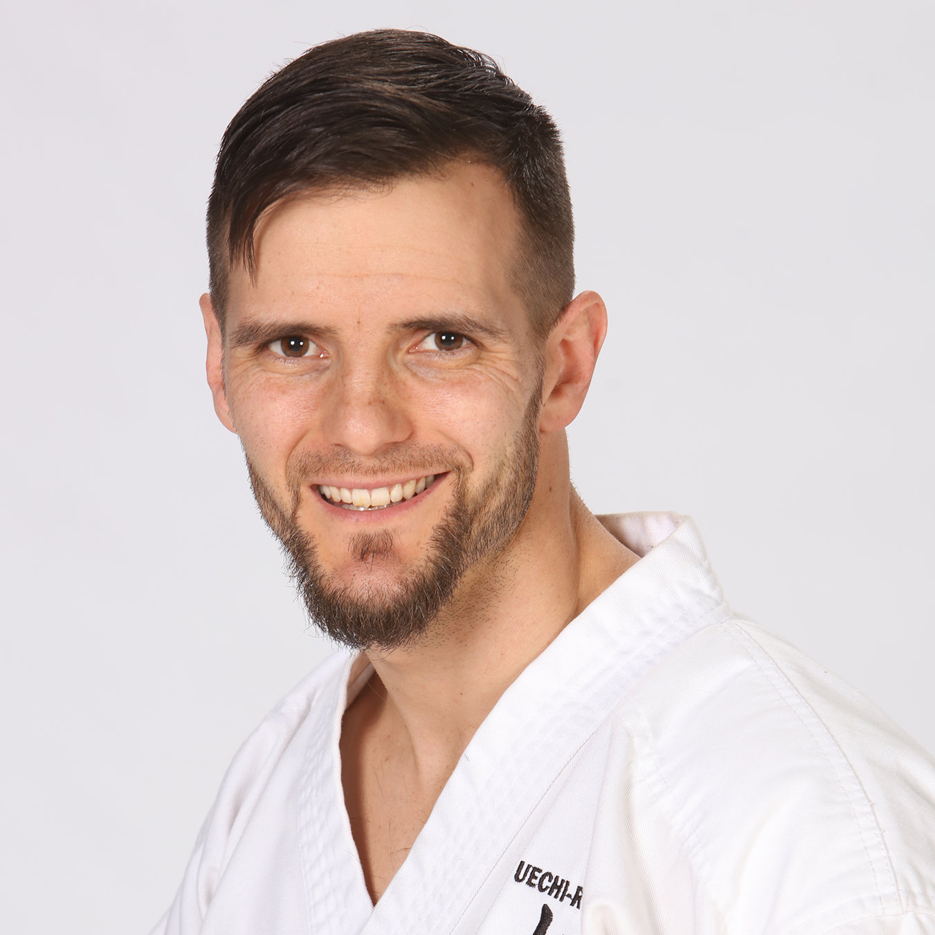 Josiah Armstrong in a karate uniform