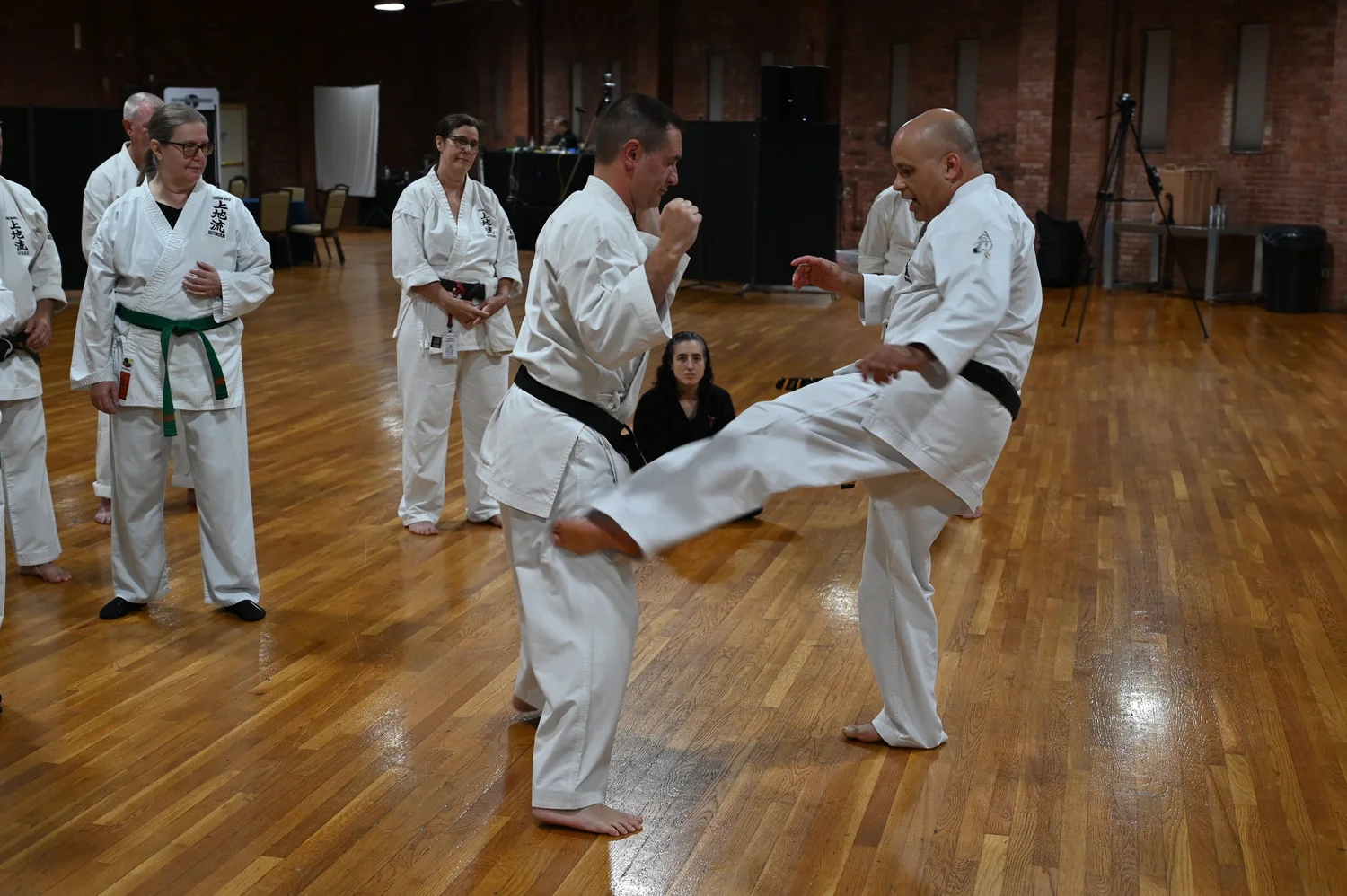 Marcus Traynor practicing karate with a partner