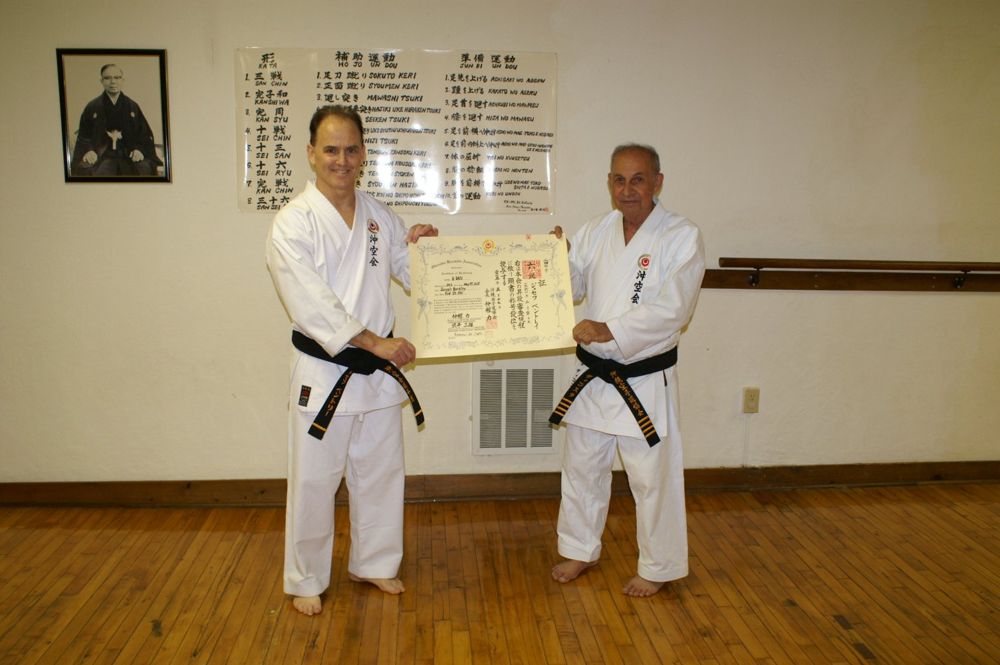 Joseph Bentley practicing karate with a fellow practitioner