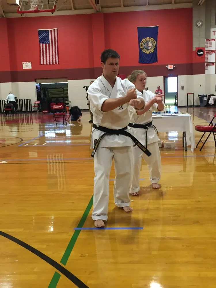 Matthew Darling practicing karate in a dojo