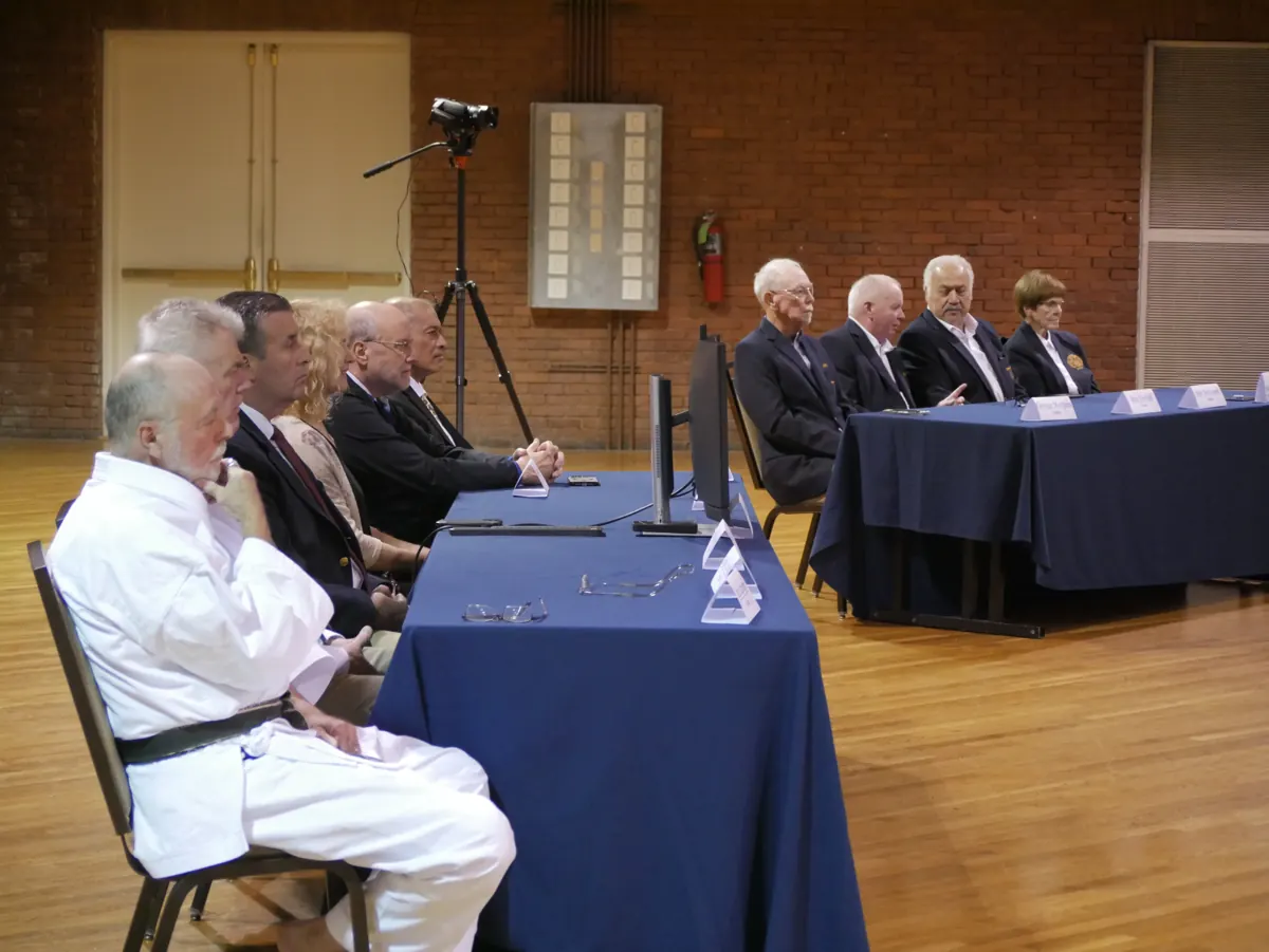 Senior practitioners seated at the Master’s Testing panel during UechiCon