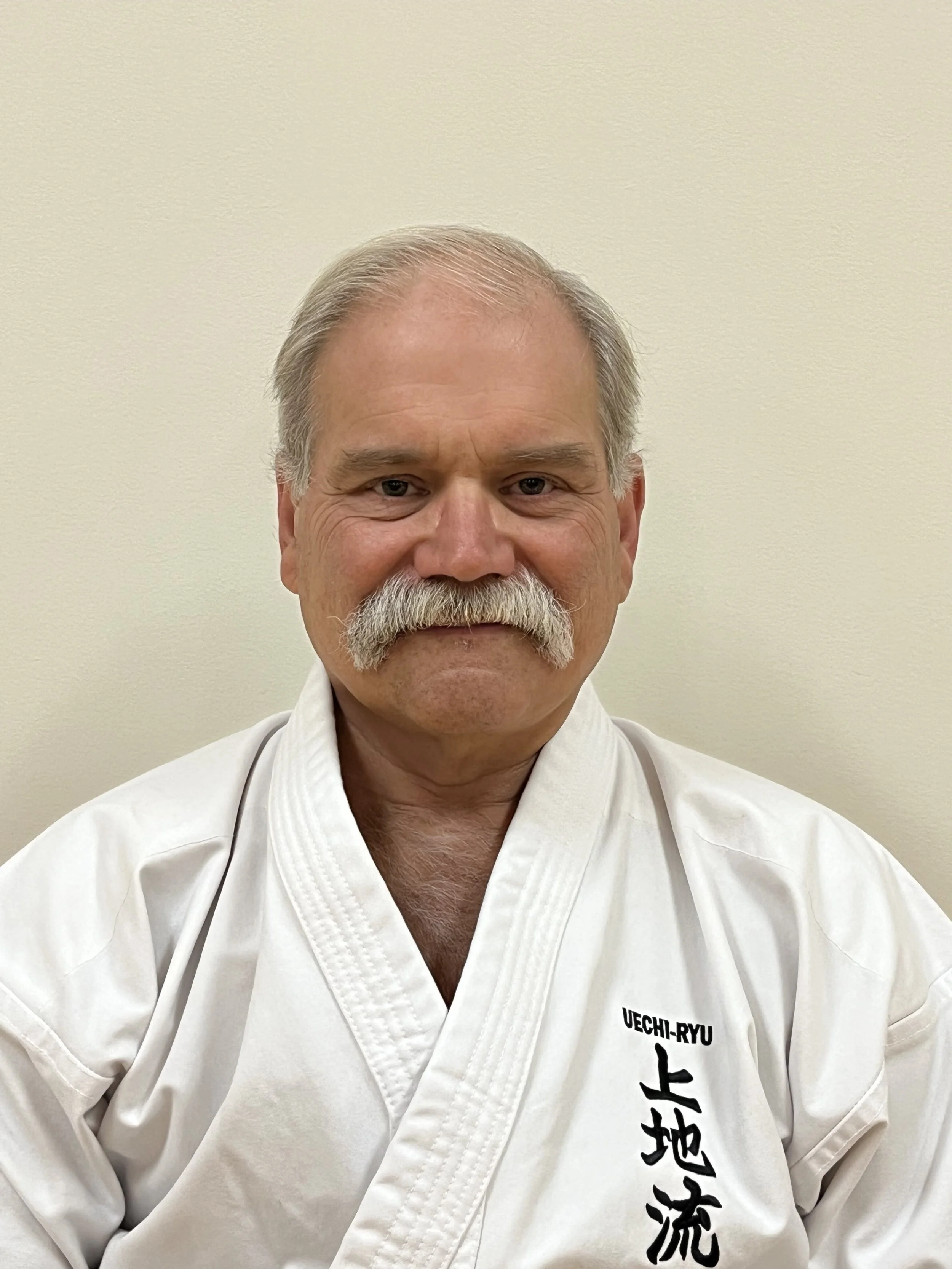 Paul Trickett in a karate uniform