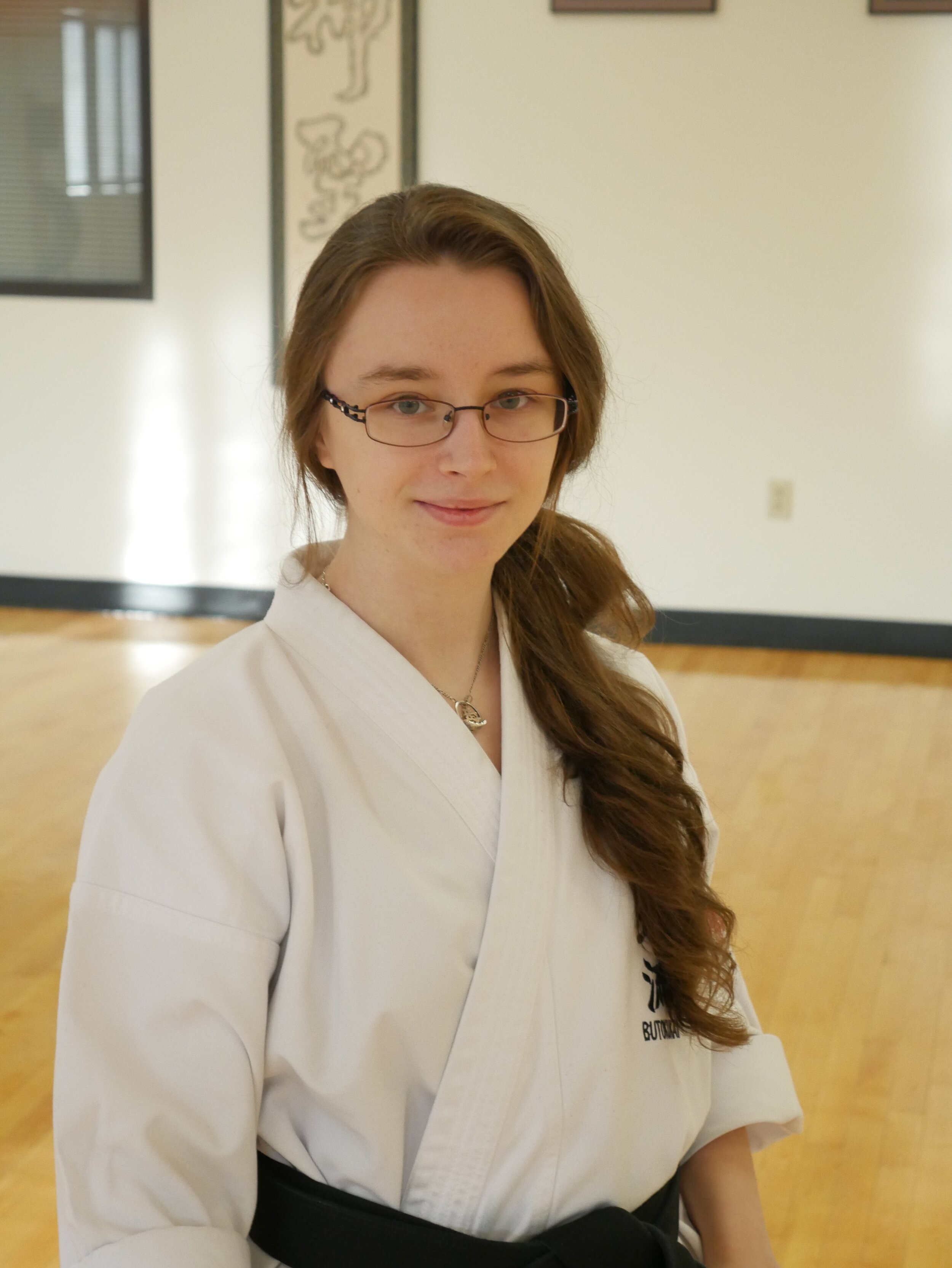 Stephanie Rodenhiser in her karate uniform at the dojo