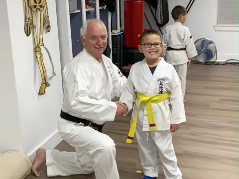 Archived photograph from 2024 Junior Black Belt Graduates