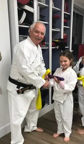 Archived photograph from 2025 Junior Black Belt Graduates