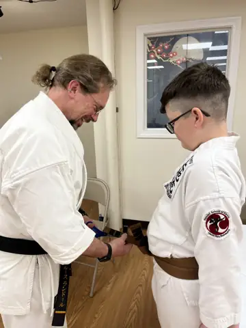Archived photograph from 2024 Junior Black Belt Graduates