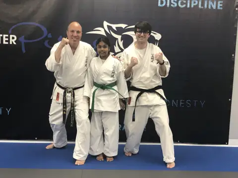 Archived photograph from 2025 Junior Black Belt Graduates